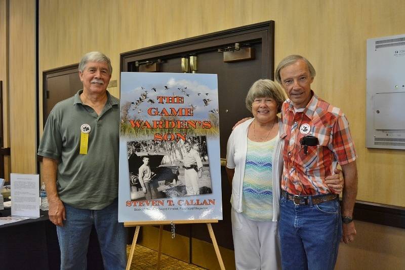 Author Steven T. Callan and friends at a book signing for The Game Warden's Son at the Pacific Flyway Decoy Association Wildfowl Art Festival
