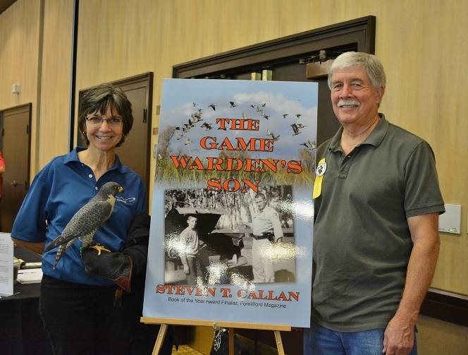 Author Steven T. Callan and friends at a book signing for The Game Warden's Son at the Pacific Flyway Decoy Association Wildfowl Art Festival