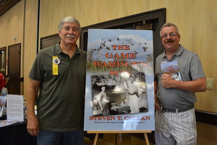 Author Steven T. Callan and friend at a book signing for The Game Warden's Son at the Pacific Flyway Decoy Association Wildfowl Art Festival