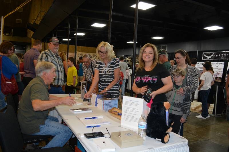 Author Steven T. Callan and friends at a book signing for his new book, The Game Warden's Son, at the Redding Sportsman's Expo, April 1, 2017