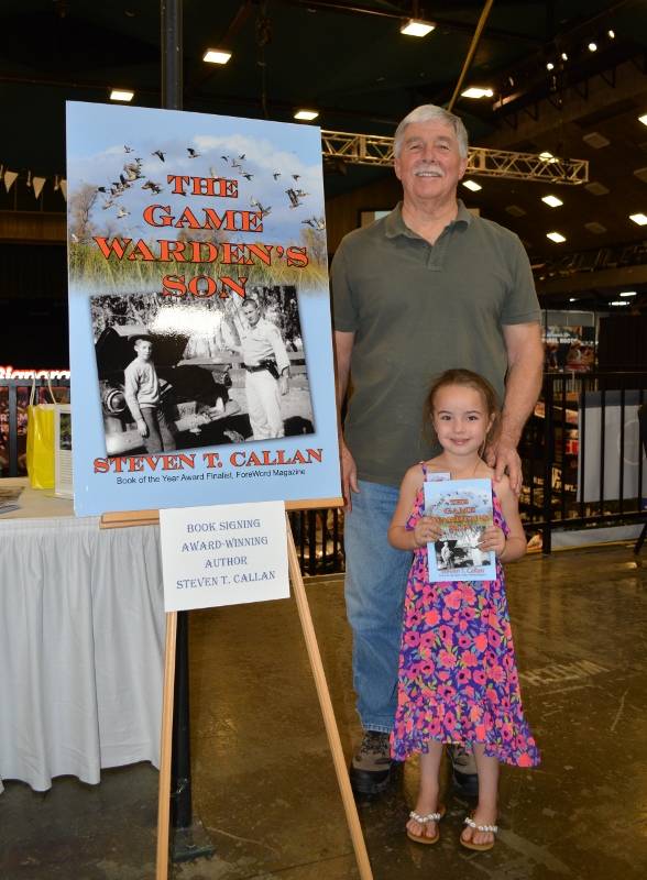 Author Steven T. Callan and friend at a book signing for his new book, The Game Warden's Son, at the Redding Sportsman's Expo, April 1, 2017