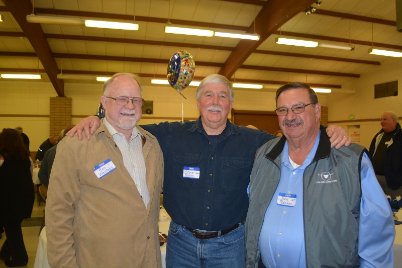 Ron Westaby and John Romano visit with author Steven T. Callan during the Orland Alumni Awards Dinner.