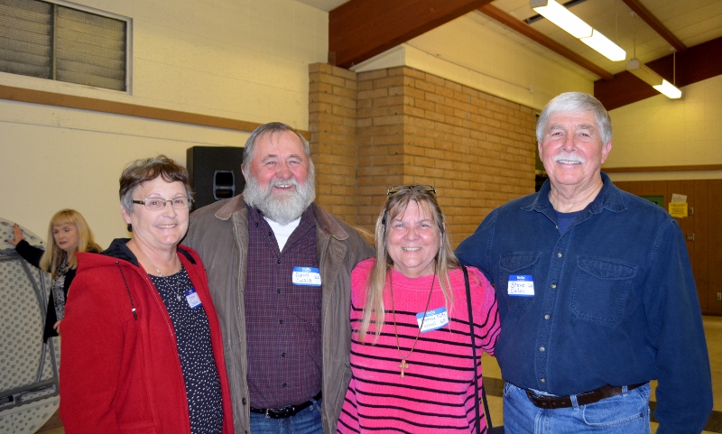 Irene Skala, Dan Skala, and Theresa Forrest visit with author Steven T. Callan at the Orland Alumni Association Awards Dinner.