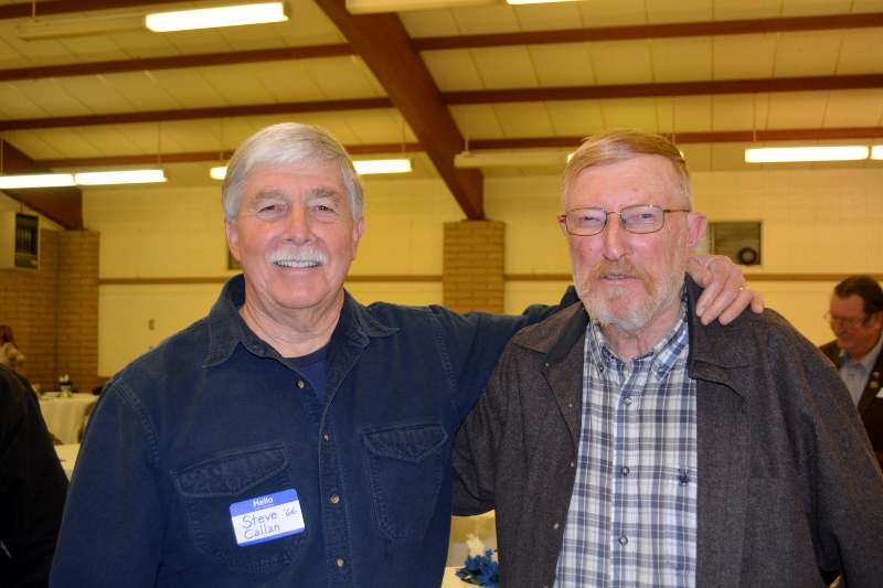 Author Steven T. Callan visits with Dr. Gene Russell at the Orland Alumni Association Awards Dinner.