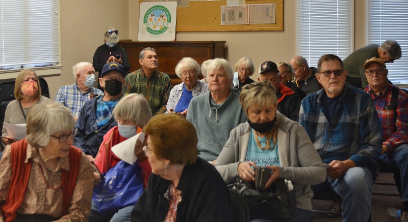 As visitors fill the Orland Carnegie Community Center to hear author Steven T. Callan, extra chairs are needed.