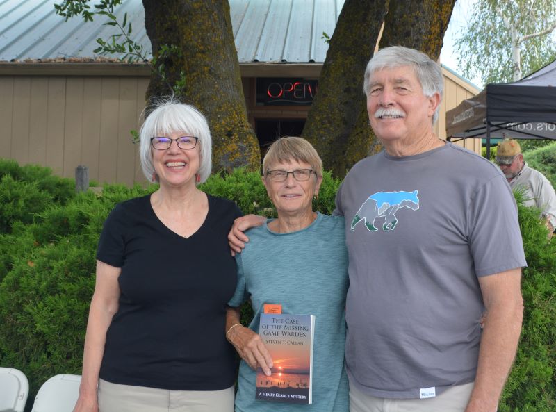 Author Steven T. Callan, Kathy Callan, and friend at the author's recent book signing at Redding's Fly Shop