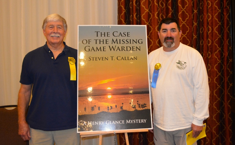 Author Steven T. Callan poses with friend at book signing for his award-winning novel ,The Case of the Missing Game Warden