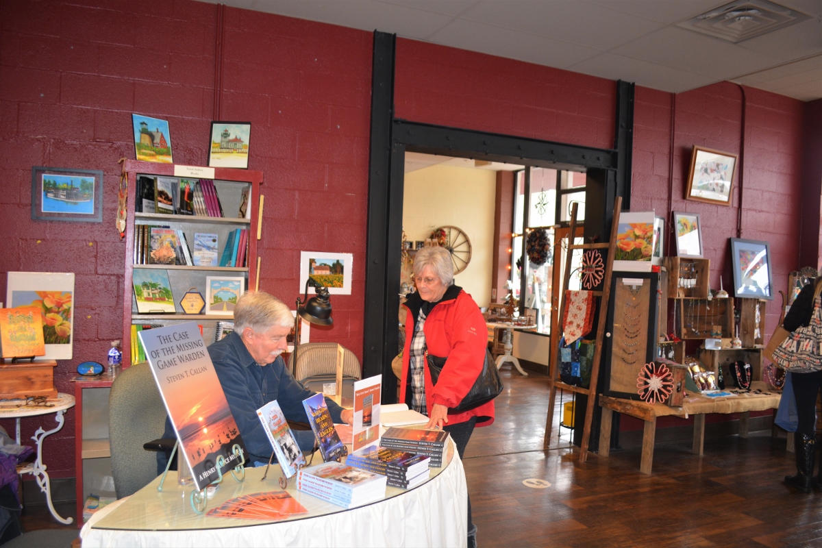 Author Steven T. Callan and friend at his book signing at Orland's Rusty Wagon boutique