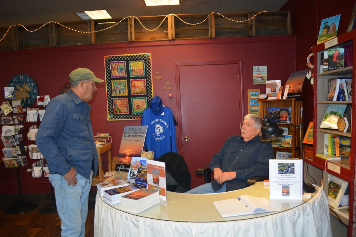 Author Steven T. Callan and friend at his book signing at Orland's Rusty Wagon boutique