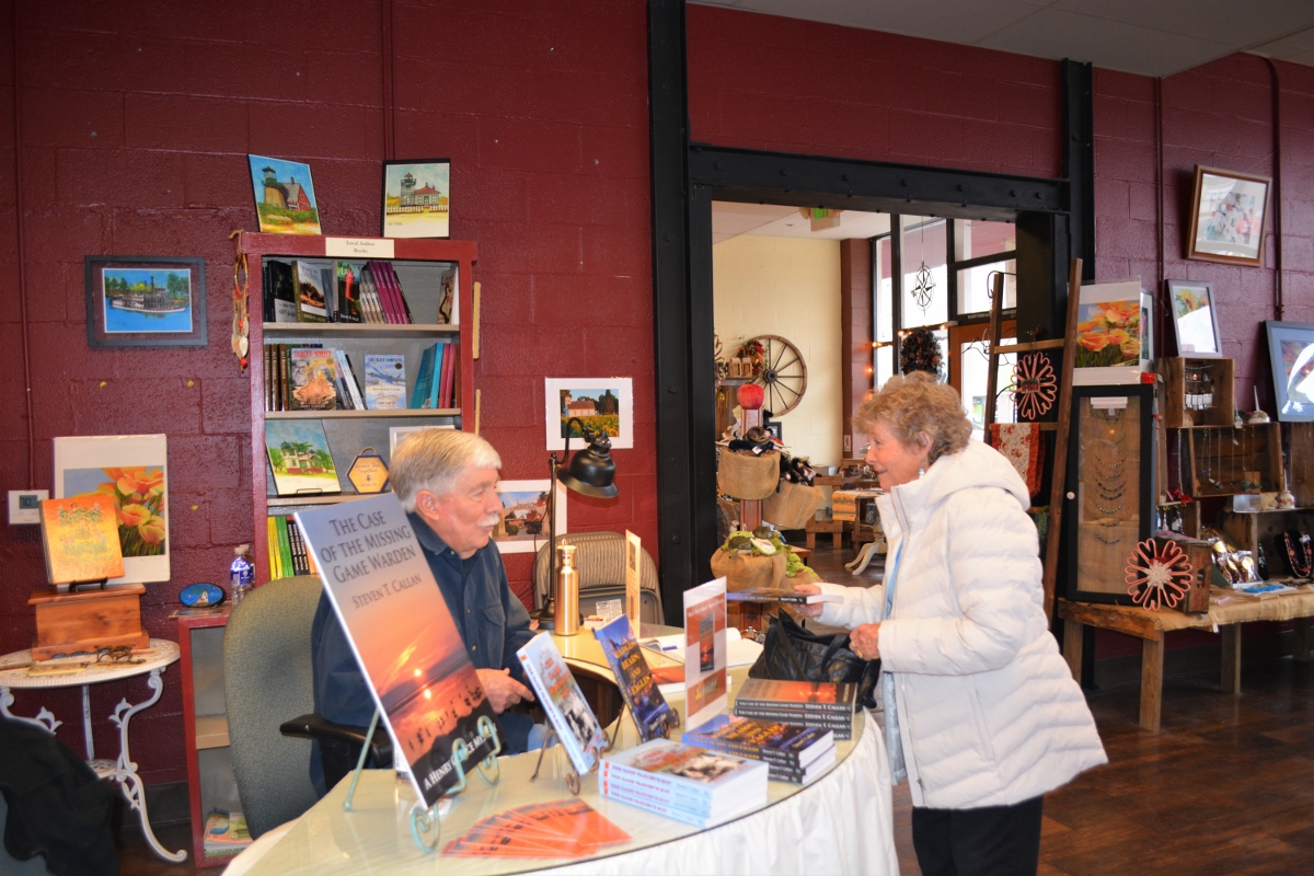 Author Steven T. Callan and friend at his book signing at Orland's Rusty Wagon boutique