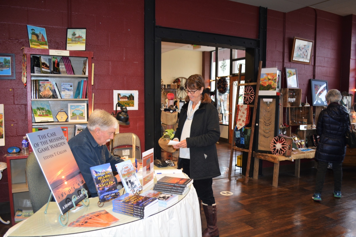 Author Steven T. Callan and friend at his book signing at Orland's Rusty Wagon boutique